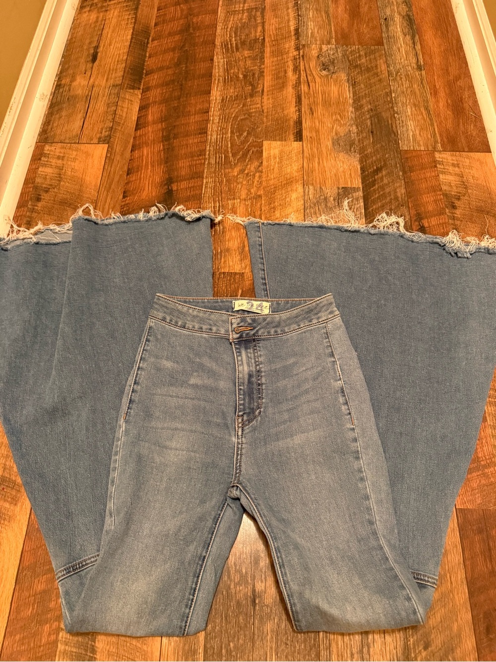 Free People Light Blue High-Rise Wide-Leg Jeans with Frayed Hem